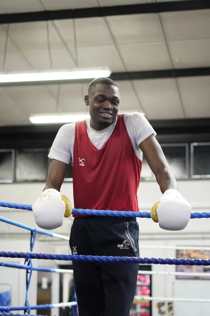Dimeji Shittu leaning on the ropes at Five Star Amateur Boxing Club